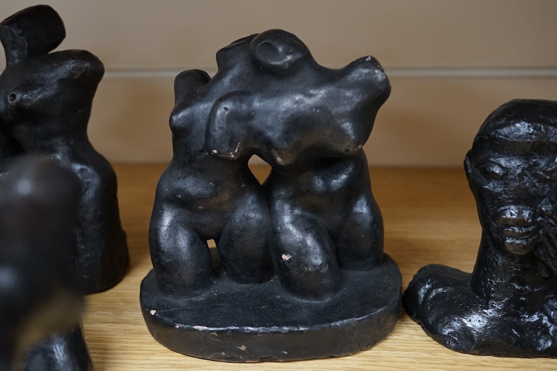Three pairs of small black figural abstract sculptures, together with two similar sculptures. (8). Tallest 15cm high